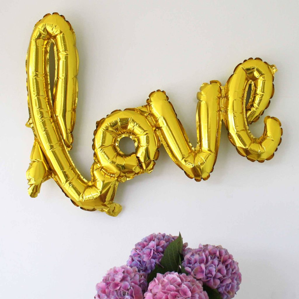 love balloons script in gold hens party