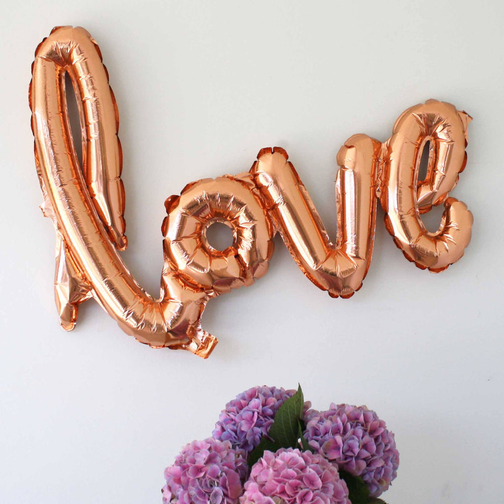 love balloons script in rose gold hens party